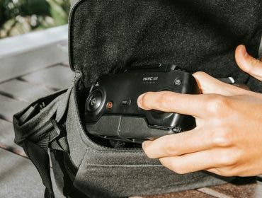 A drone user placing his drone in a drone case