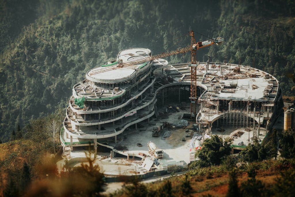 a building in construction in the forest