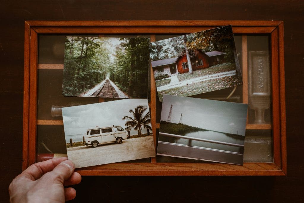 A man looks back on photos while thinking about how to stand out in the photography industry