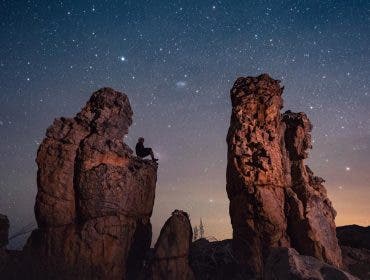 Kamran Climbs at rock in the Cederberg Mountains.jpg "A Seat Among the Stars: Embracing the Universe" (we took this image with a 14mm f1.8 Sony lens and Sony fx3)