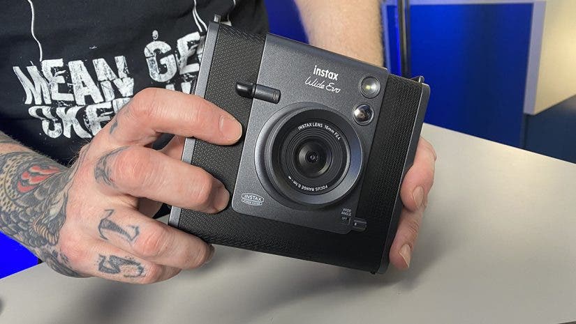Seth holding the FUJIFILM Instax Wide Evo
