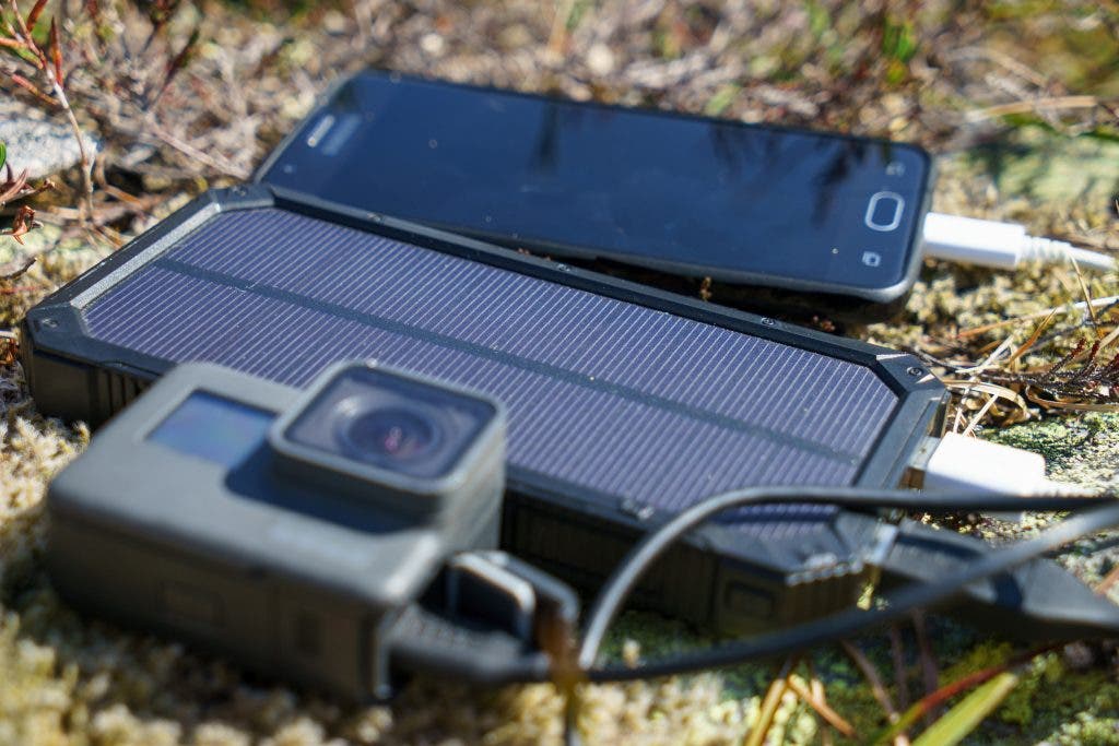 the mobile cell phone and action camera with power bank charger. Landscape photography gear.