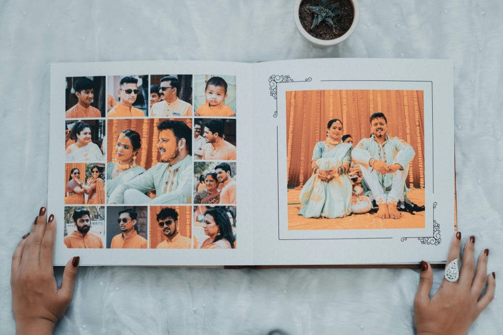 a wedding book filled with photos by a photographer