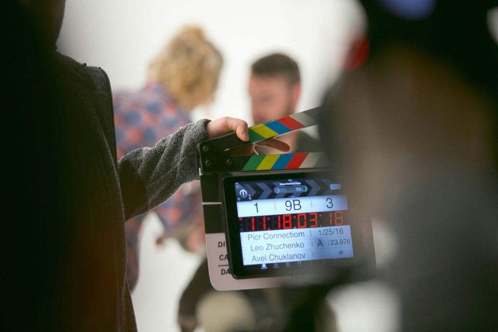 actors who signed talent release forms being filmed