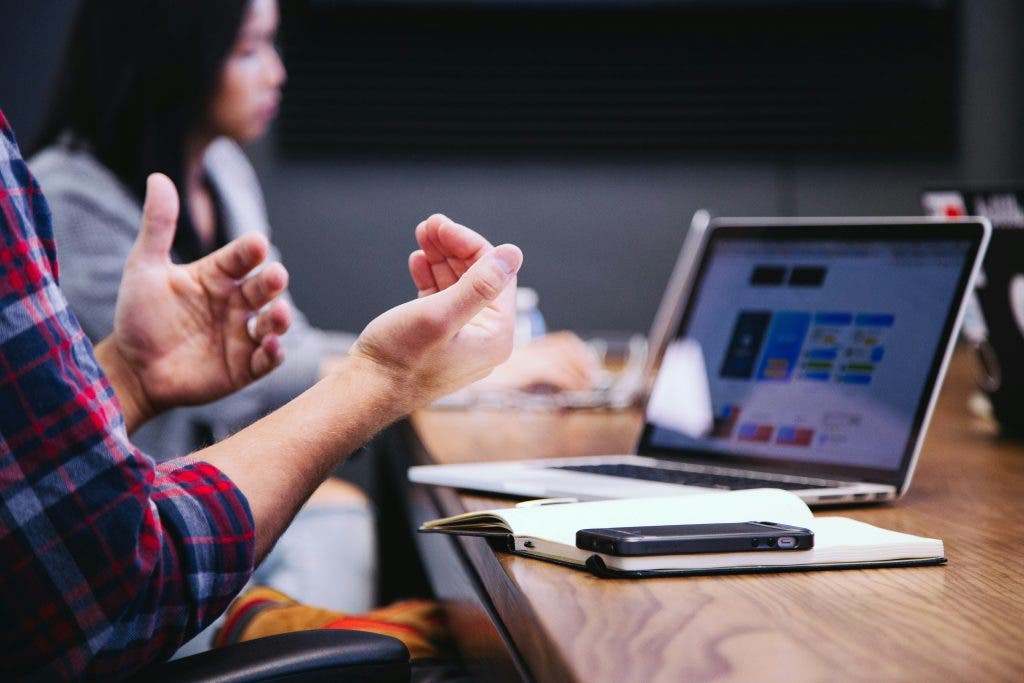Content writing examples in front of a man discussing what is content writing jobs