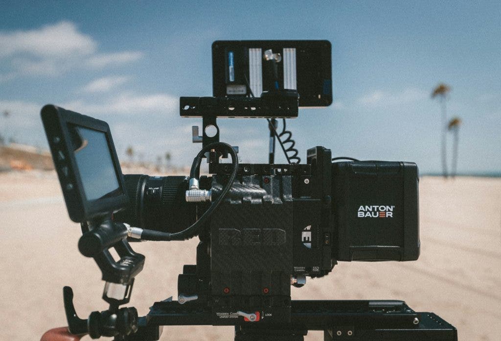 a filmmaking camera in the desert in the middle of a busy shoot day