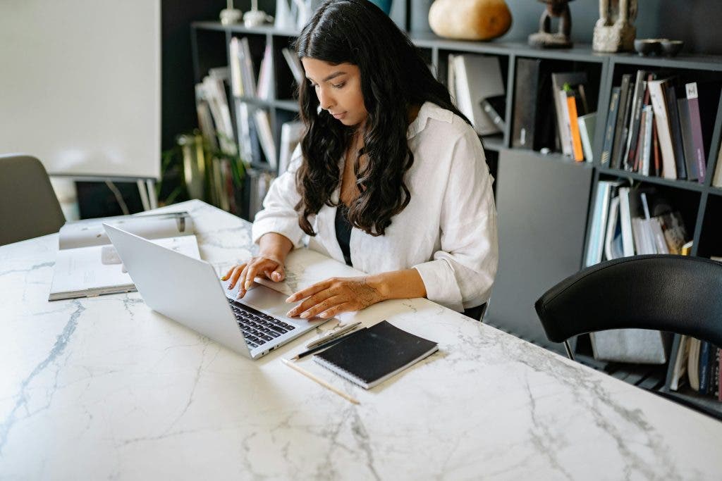 a digital marketing beginner at her desk