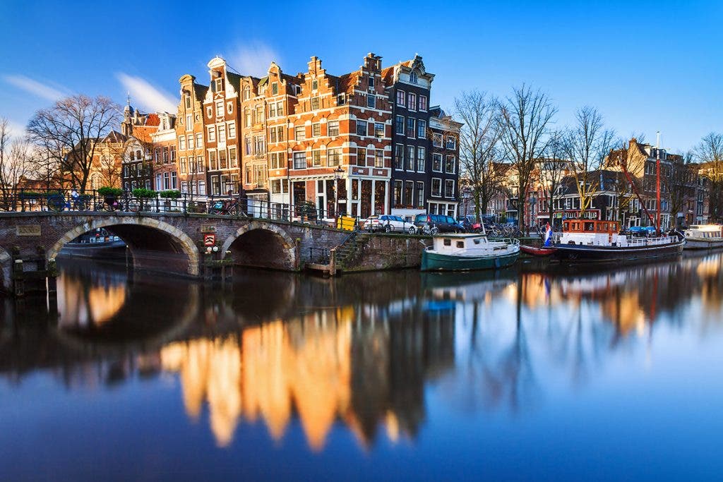 Beautiful image of the UNESCO world heritage canals the 'Brouwersgracht' en 'Prinsengracht (Prince's canal)' in Amsterdam, the Netherlands by dennisvdwater