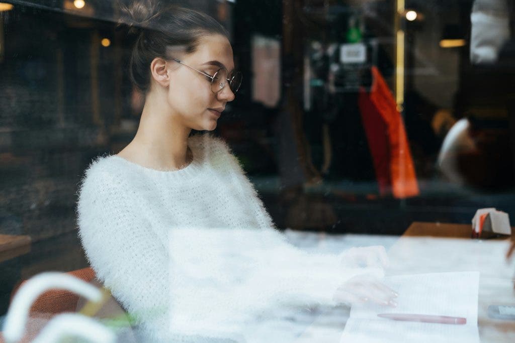 a person working at a cafe