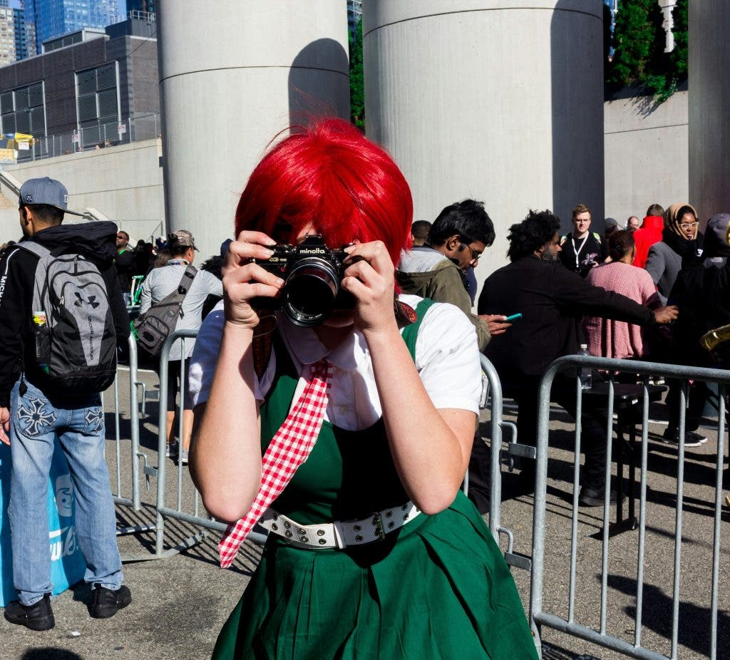 a cosplay photographer in cosplay costume
