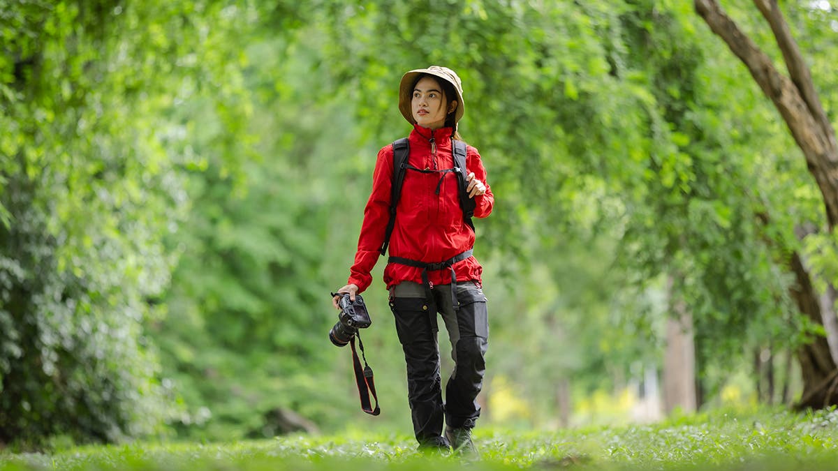 Sustainable Photographer walking