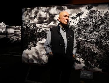 LOS ANGELES, CALIFORNIA - OCTOBER 19: Brazilian documentary photographer Sebastião Salgado stands for a photo at a press preview of his exhibit Amazônia at the California Science Center on October 19, 2022 in Los Angeles, California. The 13,000 square-foot immersive exhibit, designed by his wife Lélia Wanick Salgado, features 200 large-scale photographs and video montages taken over seven years of the Amazon rainforest, remote Indigenous tribes, and the threat deforestation poses to their survival. Salgado says, 'My wish, with all my heart, with all my energy, with all the passion I possess, is that in 50 years' time this exhibition will not resemble a record of a lost world.' The exhibit is making its North American debut on October 21st and is supported by the Annenberg Foundation. (Photo by Mario Tama/Getty Images)