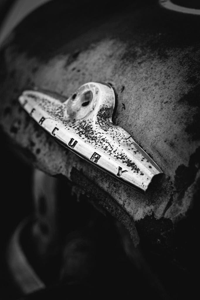 Old paint, pitted chrome, and grit. The kind of texture you can only earn over time.