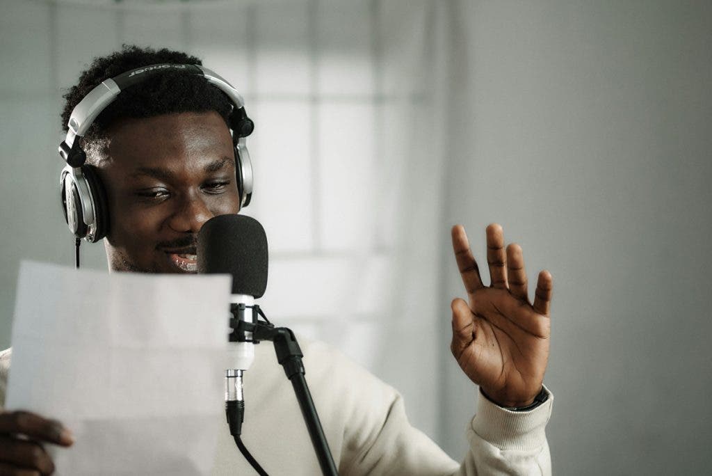 Man speaking into a microphone