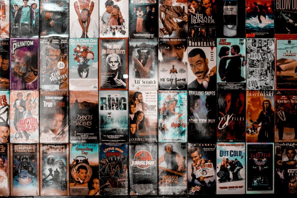a photo of a wall filled with movie posters