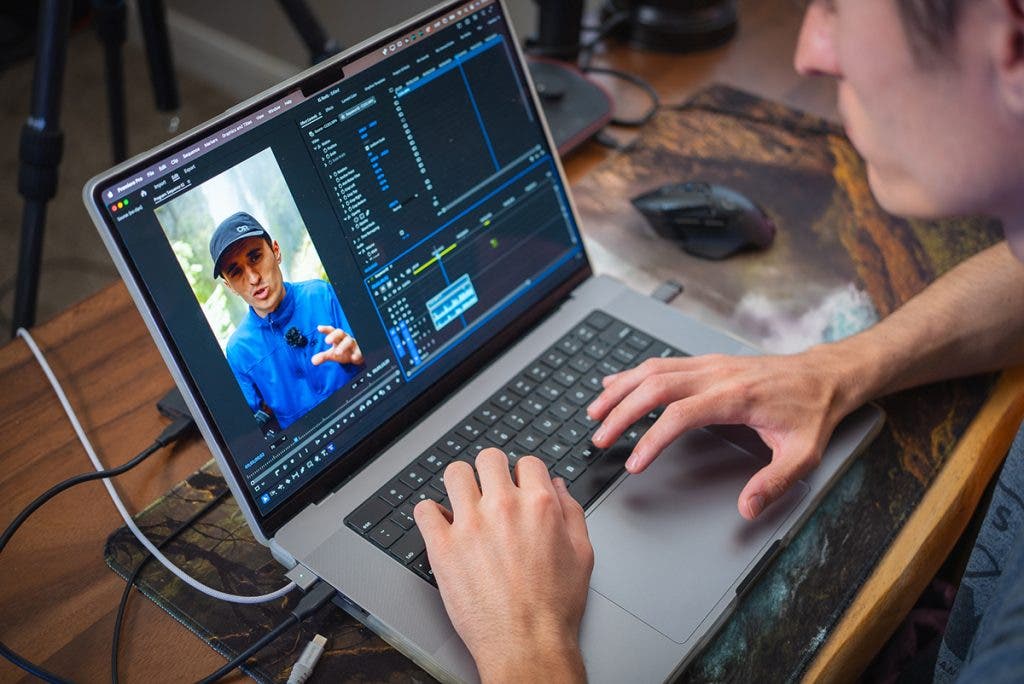 Austin working on a MacBook
