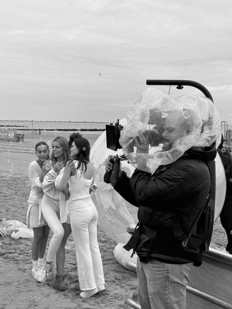 At work on set, a modeling shoot in the background