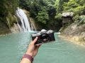 the OM System OM-3 in front of waterfalls