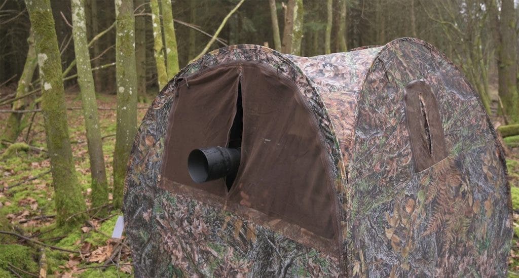 hidden camera in a camouflage tent