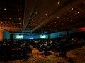 A crowded hall at WPPI 2026 while Annie Leibovitz discusses her new book WOMEN