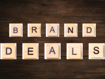 "brand deals" spelled out in wooden characters