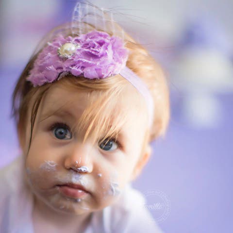 baby girl icing on the face